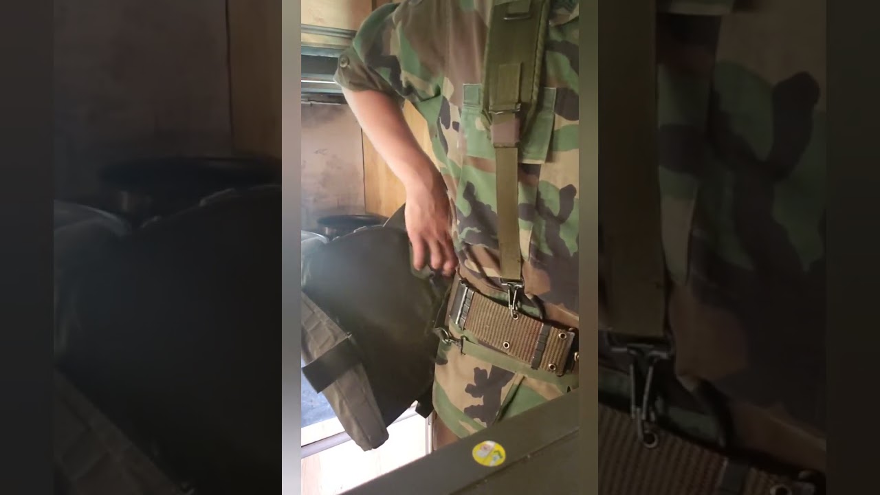 How to put on a M40/M42 gas mask bag properly