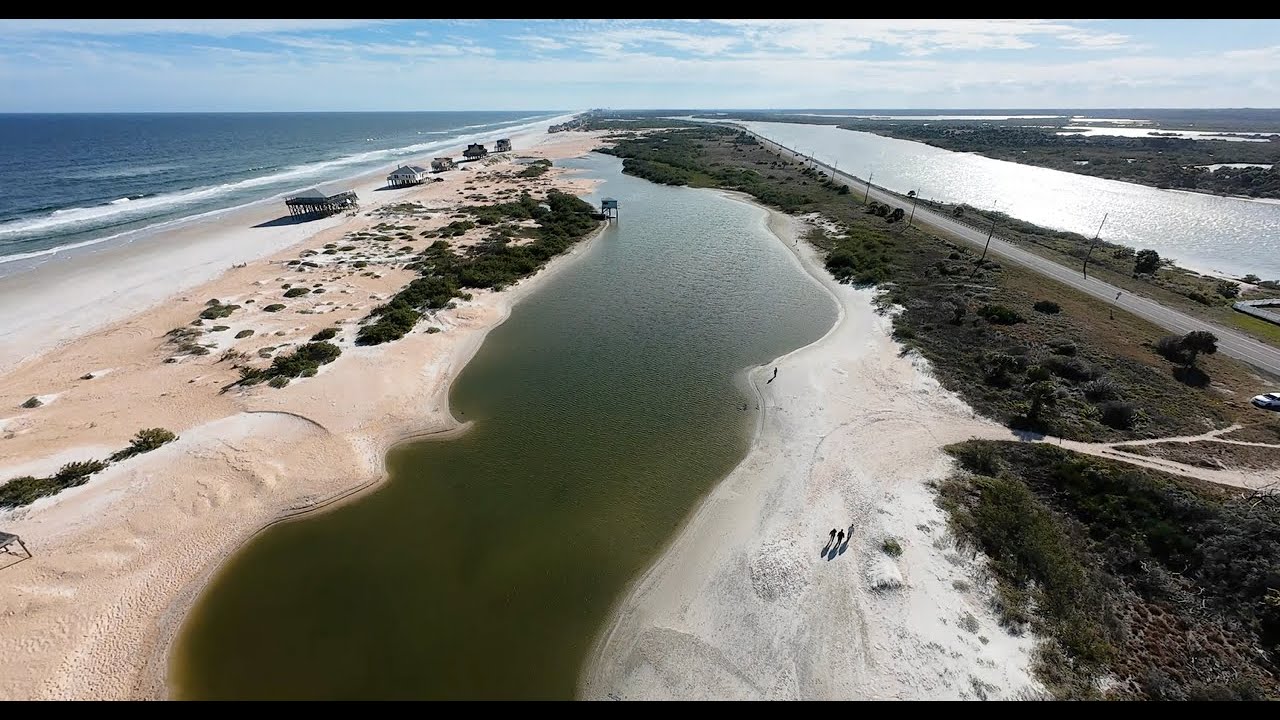 Beach Houses at Matanzas Inlet Falling into the Ocean