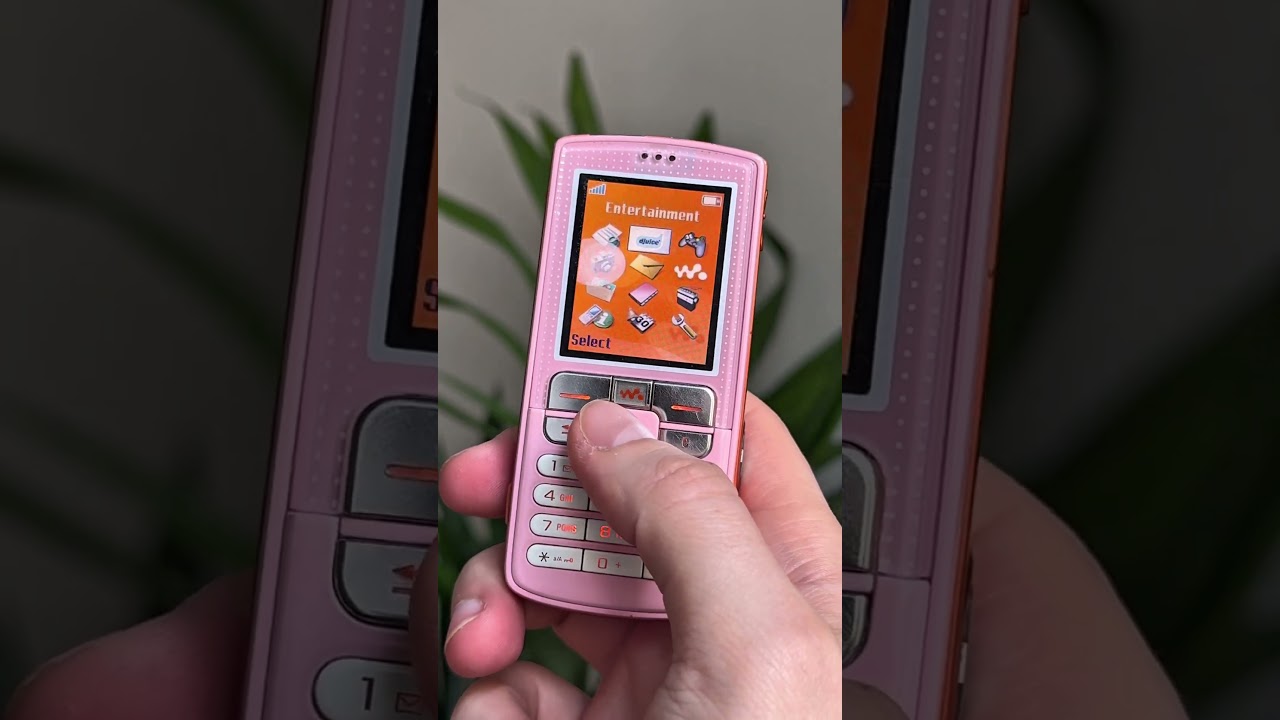 Design we lost: color identity. Sony Ericsson W800 (pink) + Nokia 6700 (green)