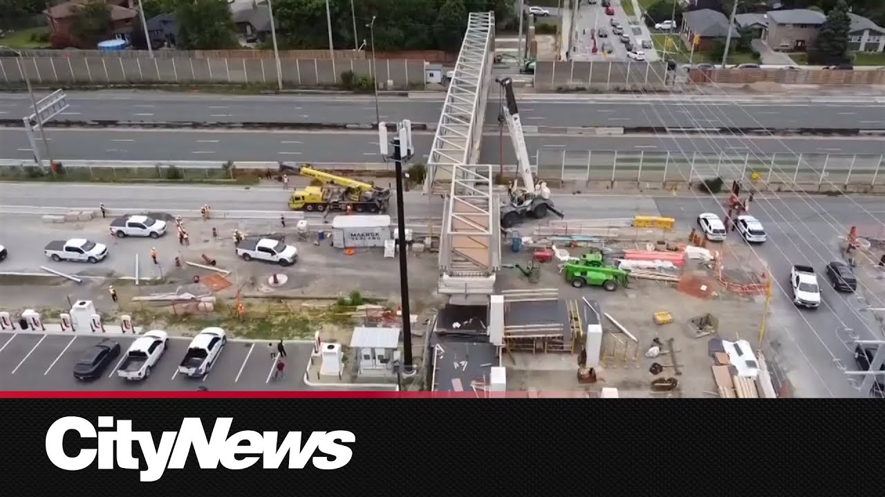 Dump truck hits bridge, triggers chaos on QEW