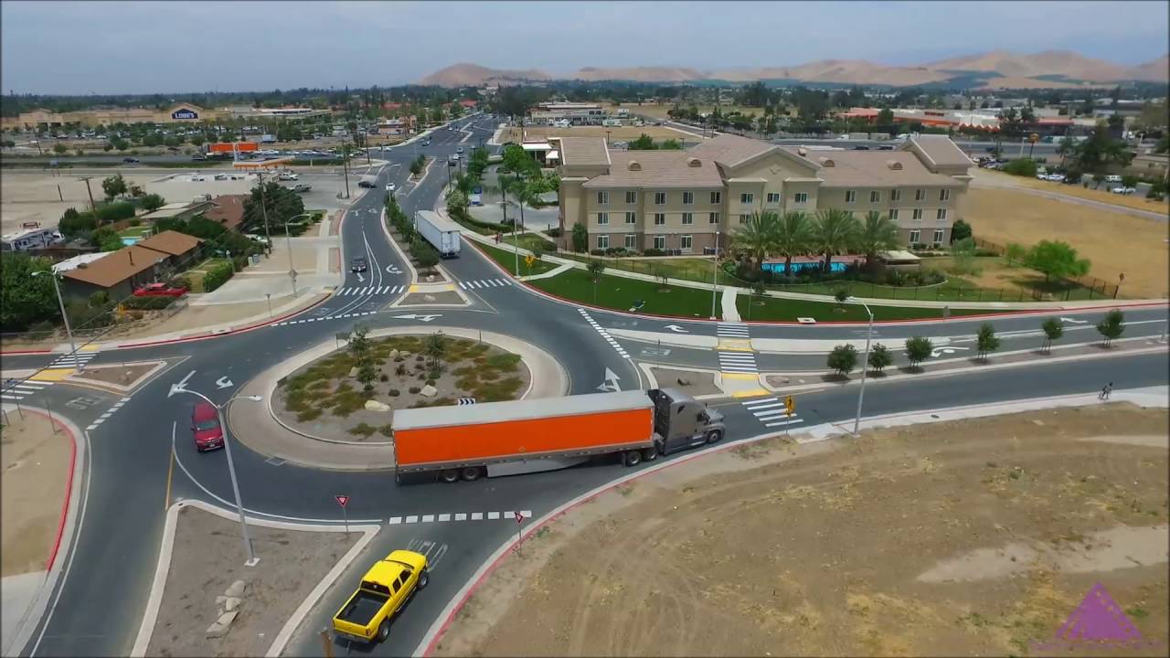 STAA Trucks Navigating Jaye St/Montgomergy Ave Roundabout (Porterville, CA)