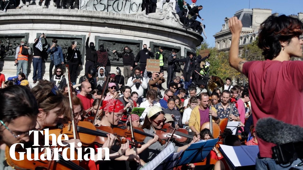 French police encircle and teargas orchestra playing at Paris protest