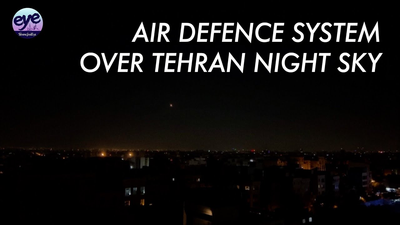 Air defence system fires seen over Tehran night sky as Israel said it launched airstrikes in Iran