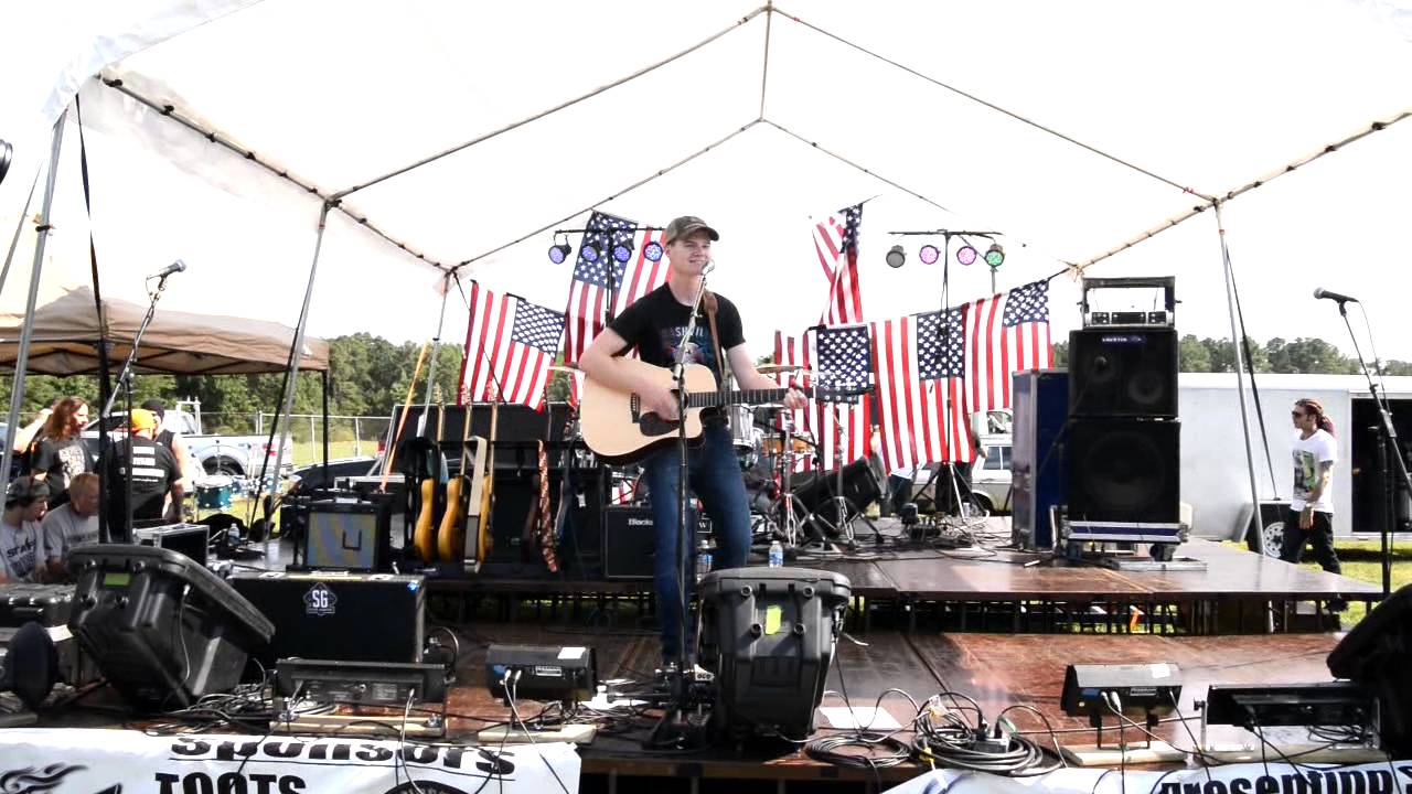Robbie Boothe performs 'I Love My Life' at St Mary's Bike Festival