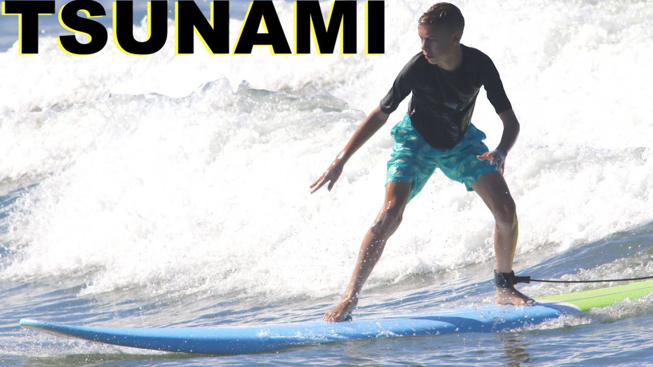 SURFING TSUNAMI WAVES! 🏄‍♂️🏄‍♀️