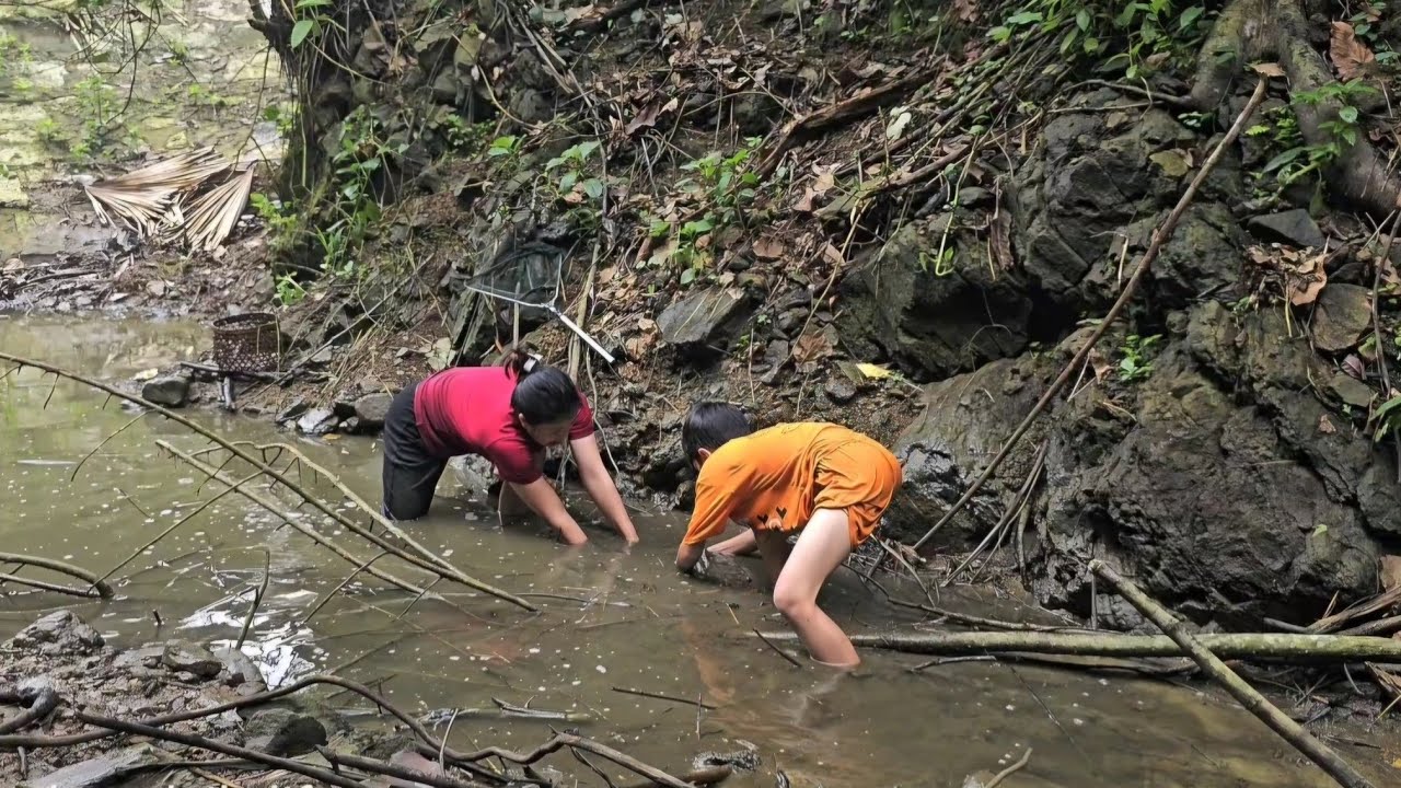 A single mother and son catch fish together, cook, and bring the fish to the market to sell.