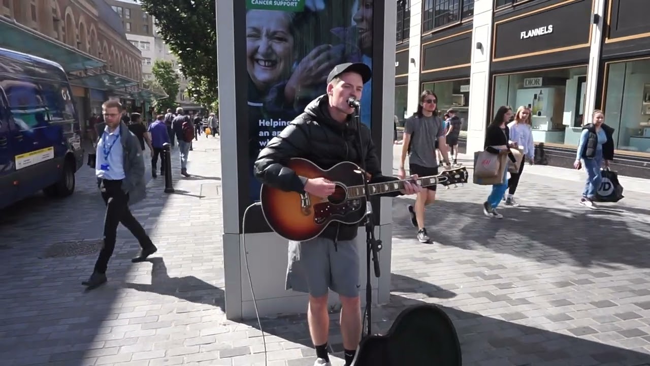 Sam Olyott  sings You'll Never Walk Alone by Gerry and the Pacemakers in Clayton Square Liverpool
