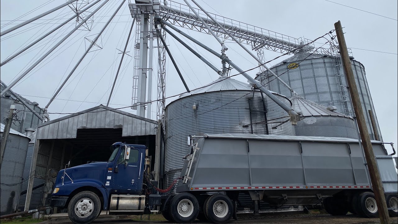 Installing an electric tarp and loading corn