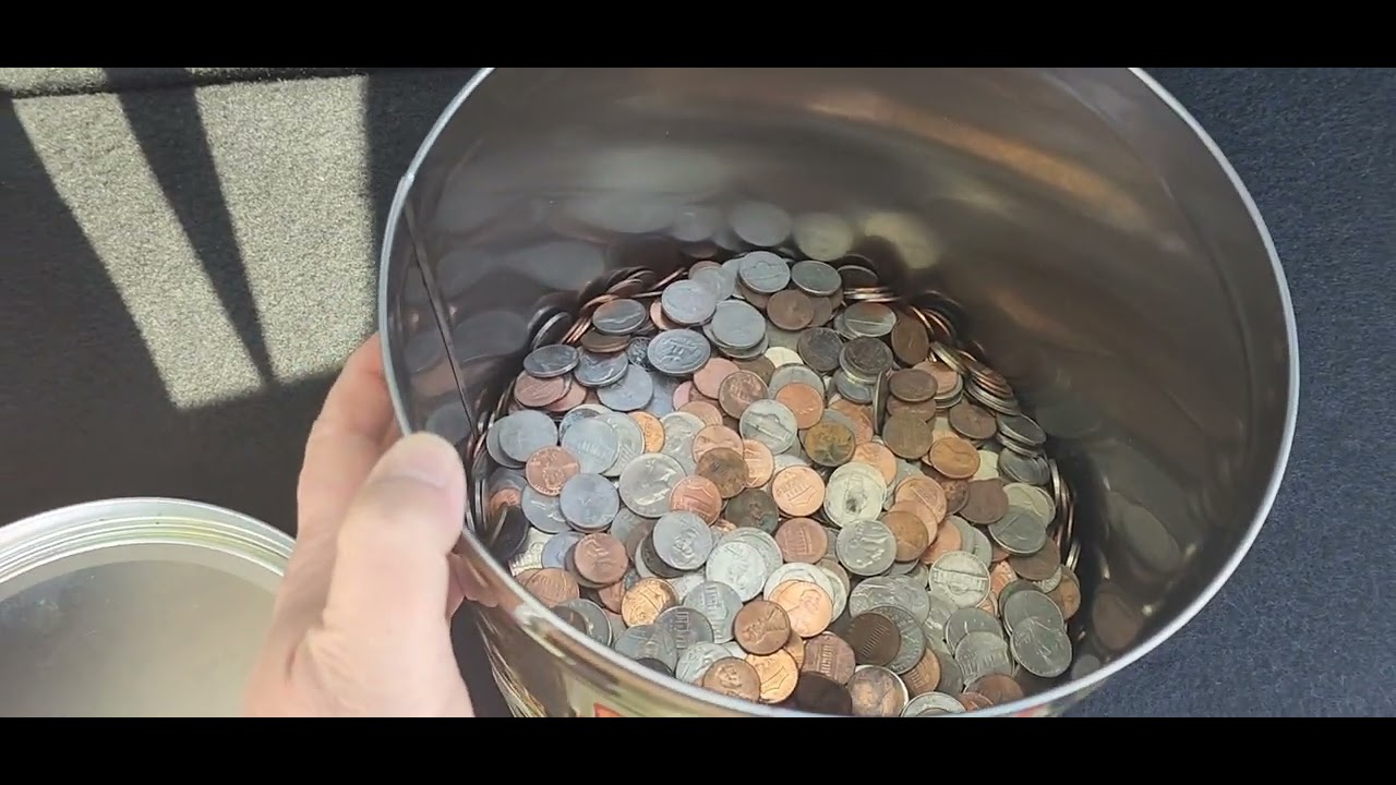 Cashing in my loose change at a Coin Star machine.