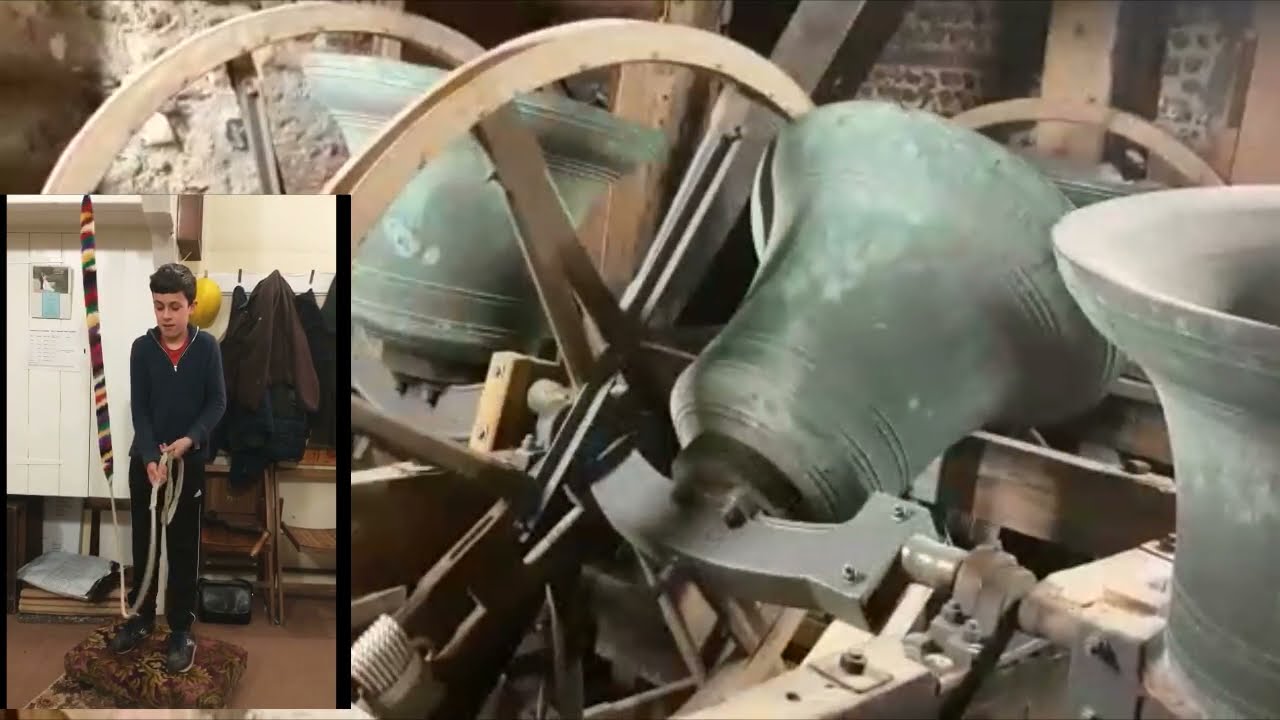 Ringing a muffled bell at St. Andrews, Tarring, West Sussex