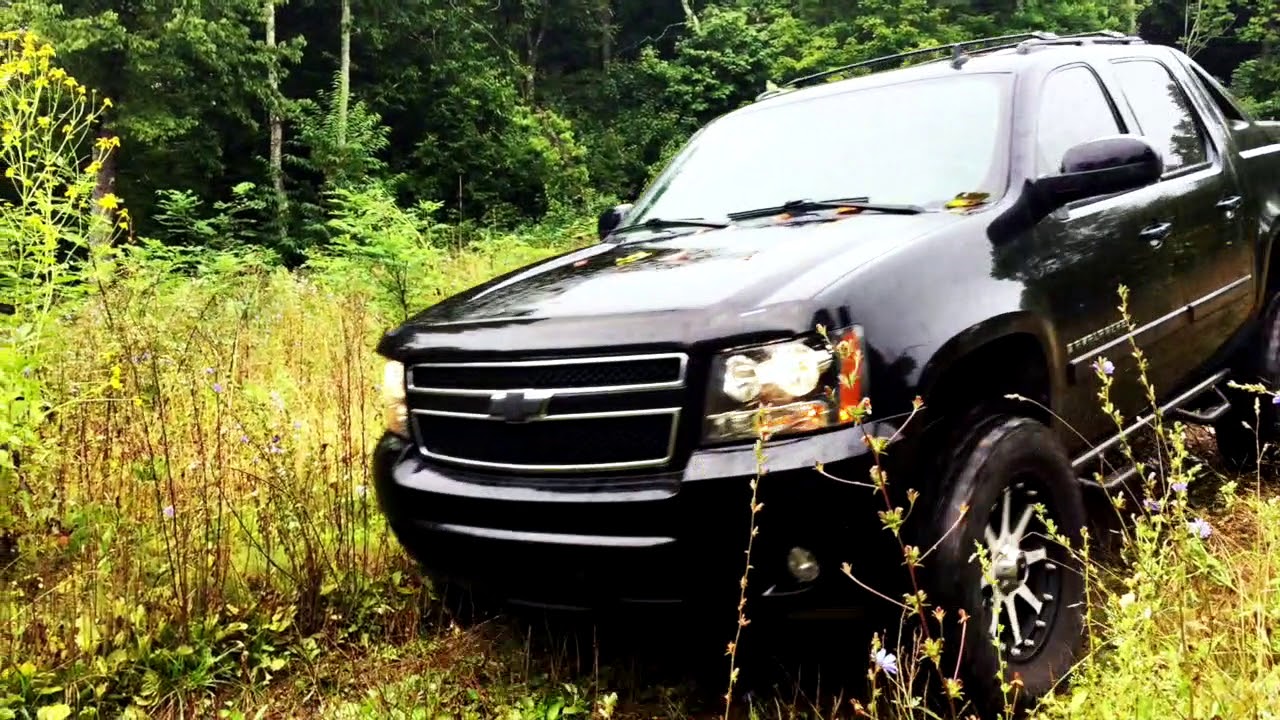 Lifted Chevy Avalanche Camping