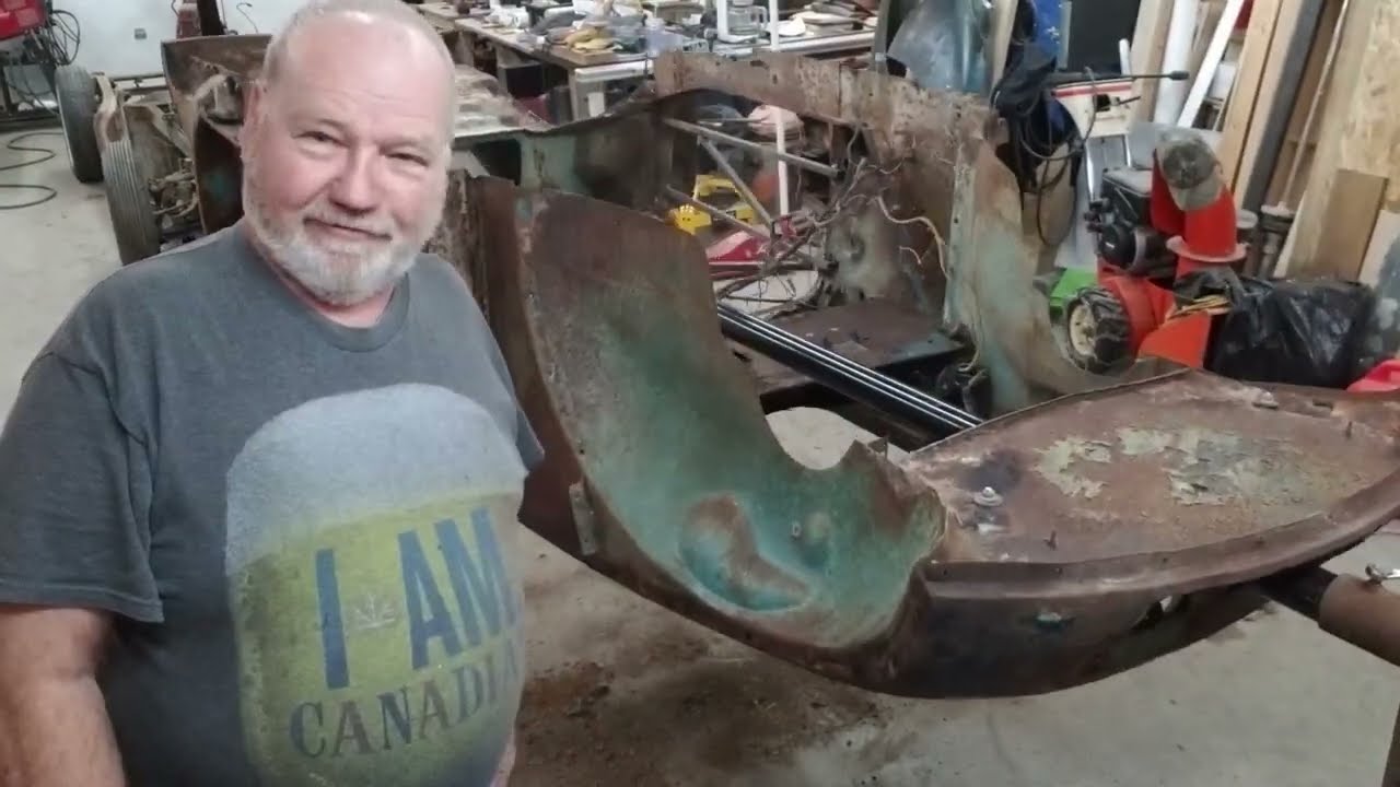 Dolly's body off MGA roadster restoration