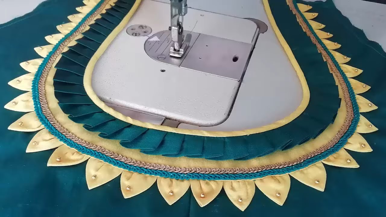 stitching of a beautiful back neck design of blouse | fashion designing