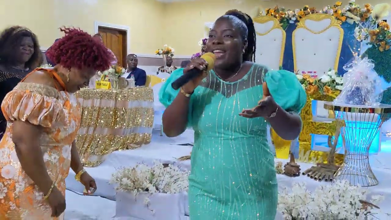Esther Bright- Ministering in a wedding in Buea .
