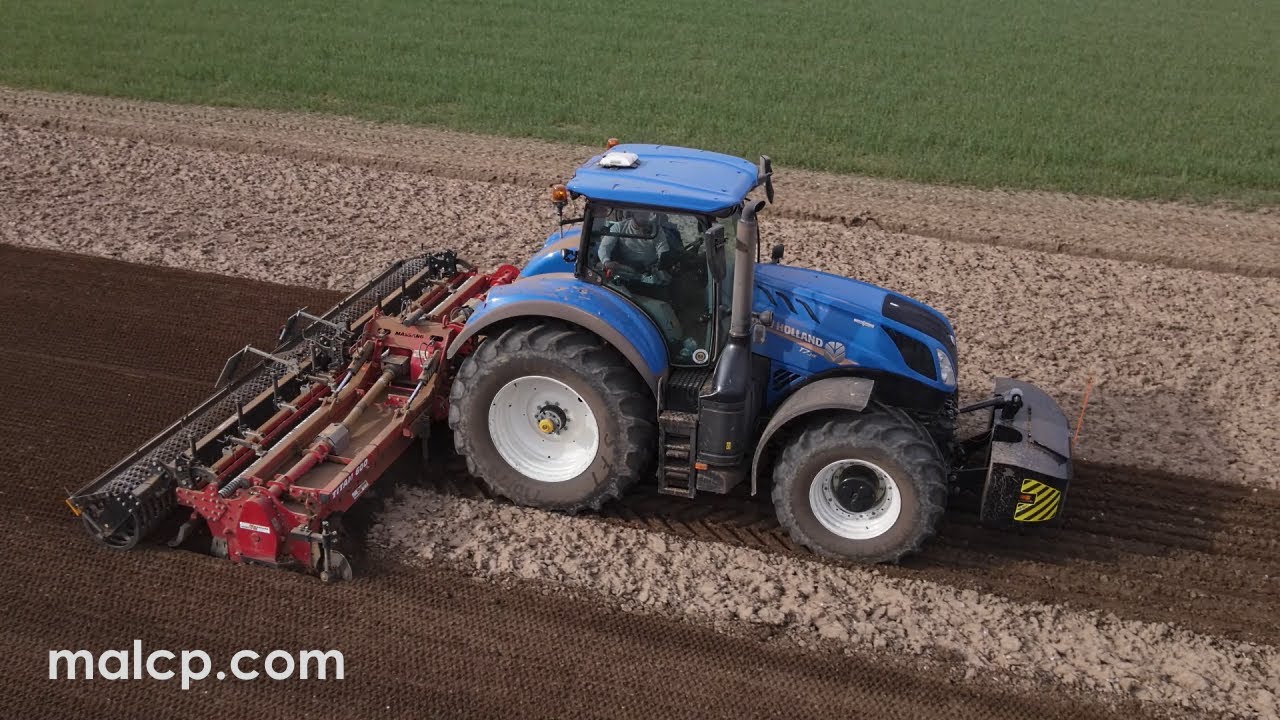 New Holland NH T7.315 & Massano Titan 600 6m stone burier destoning soil before planting spinach