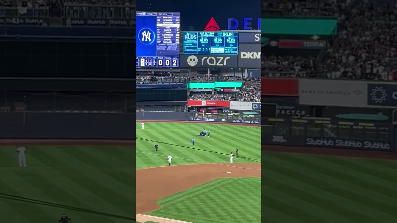 Fans tackled on field mid-ALDS chaos #shorts