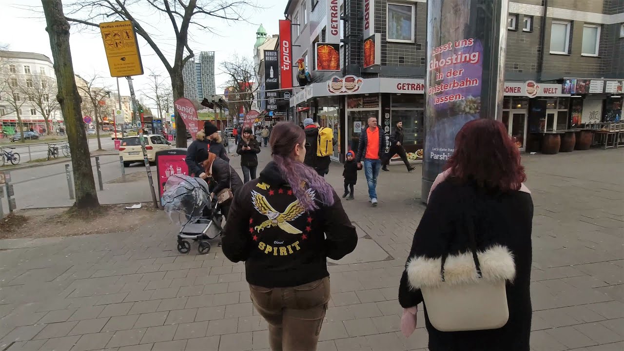 Relaxed afternoon stroll in Hamburg's most sinful street the Reeperbahn with impressions of the city