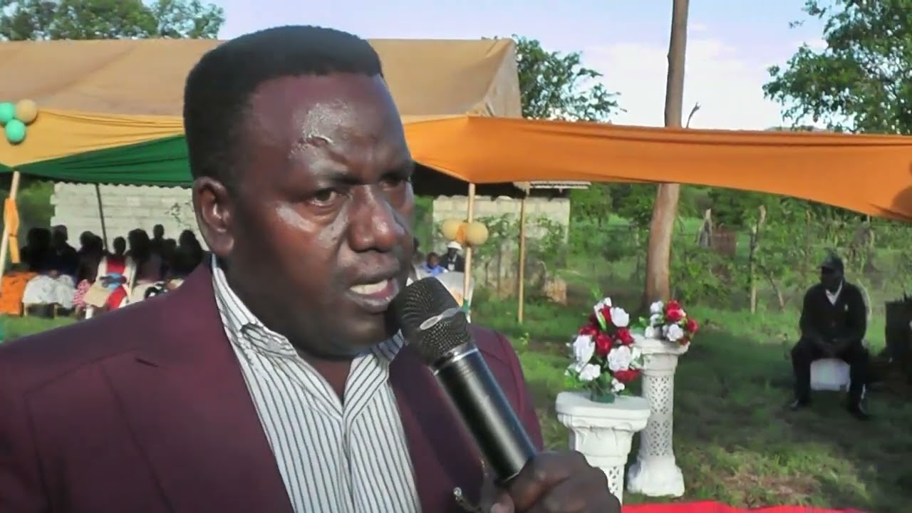 MHESHIMIWA NEWTON KARIS CAUSES LAUGHTER AT A WEDDING