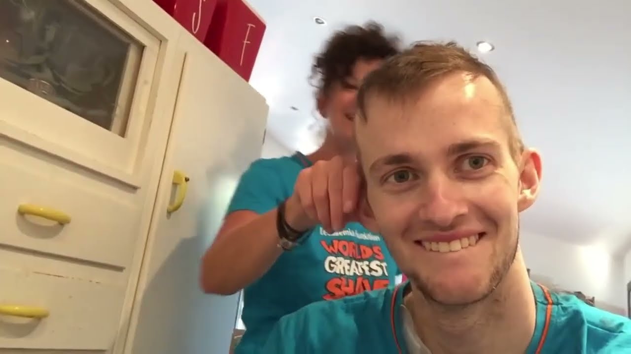 Working out then getting his head shaved