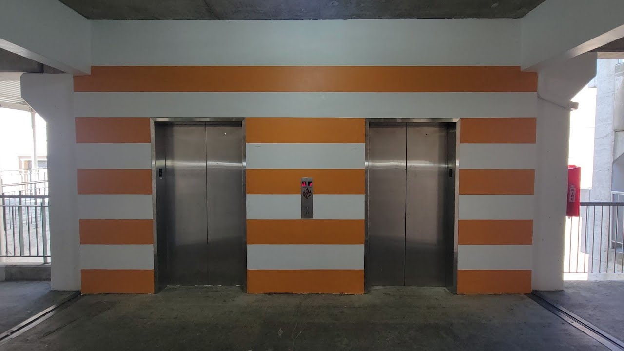 Прекрасные лифты Excel на парковке Nordstrom Orange, Roosevelt Field, Garden City, NY.