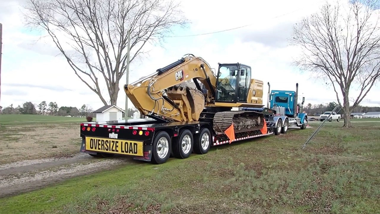 Loading Up A New Cat 320GC Excavator