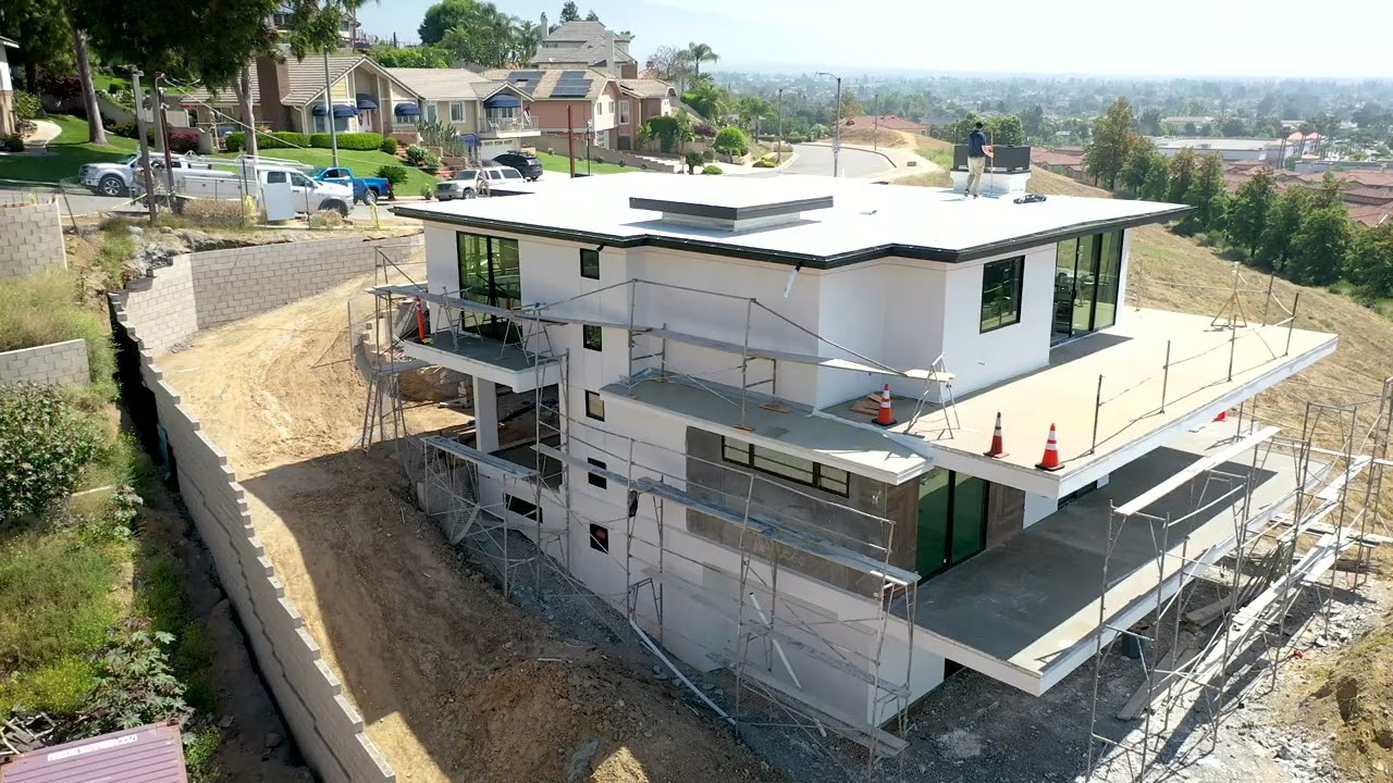 WE BUILT A HOUSE! Framing, Stucco, Windows, and Doors