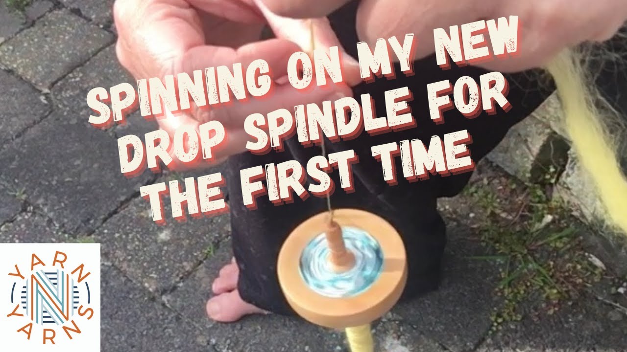Spinning on my new drop spindle for the first time