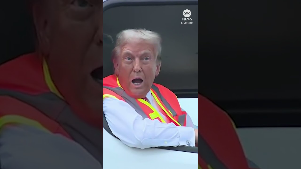 Trump speaks to reporters from garbage truck on campaign trail