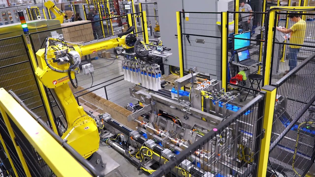 Robotic Case Packing for Plastic Bottles of Laundry Soap by Pearson Packaging Systems