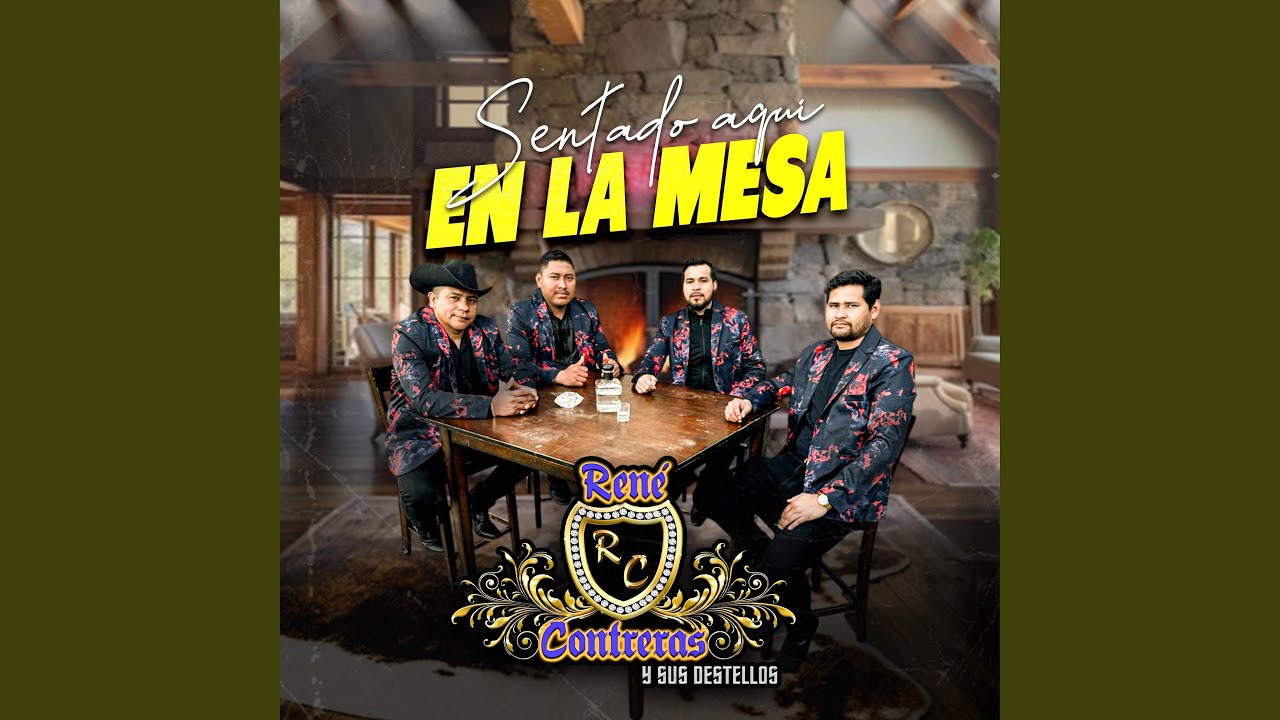 SENTADO AQUI EN LA MESA