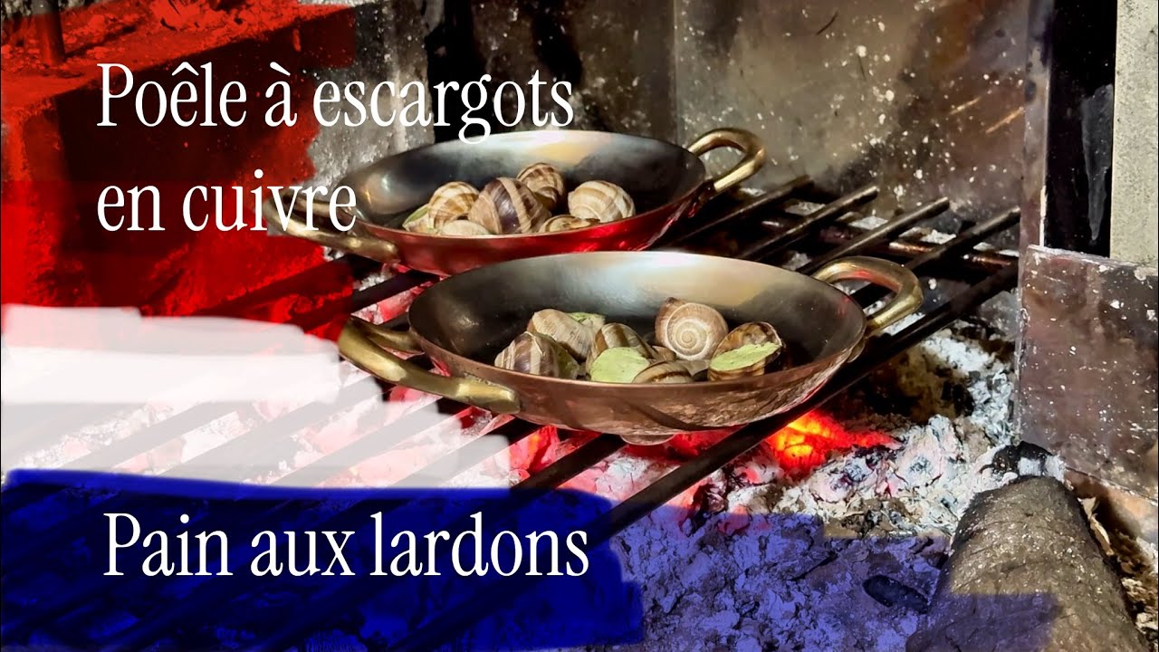 Homemade bacon bread, French snails on restored quail eggs  or snail eggs copper pan