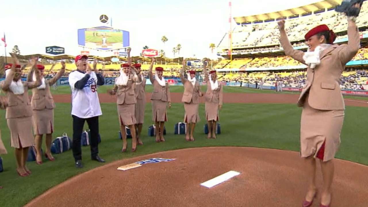 CIN@LAD: Flight attendant fires first-pitch strike