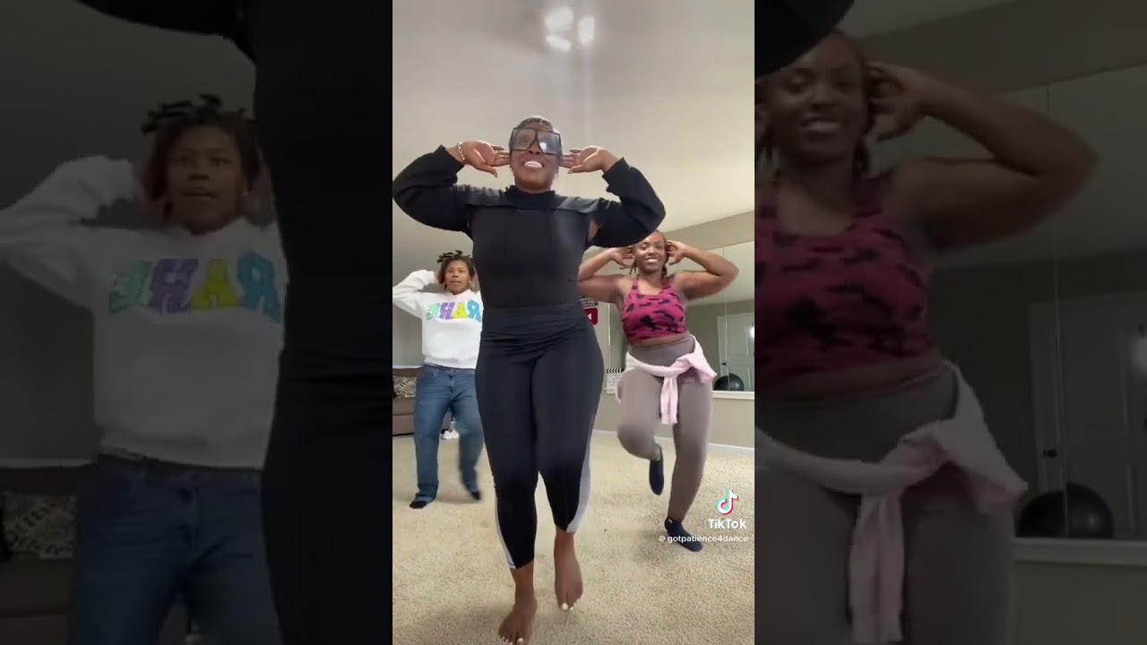 Mother and daughters do an 8 count of majorette 