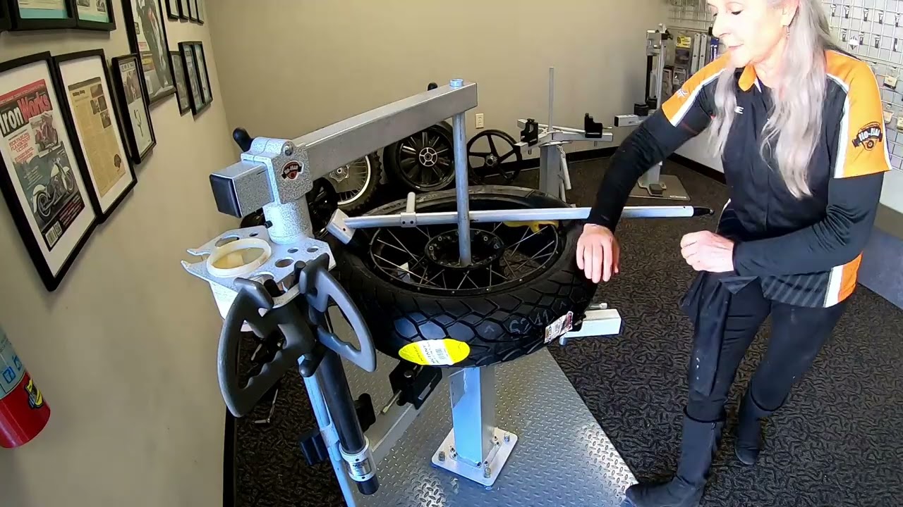 No-Mar Tire Changer Classic. BMW GS REAR WHEEL using Mount Demount Bar to install a Dunlop Mutant