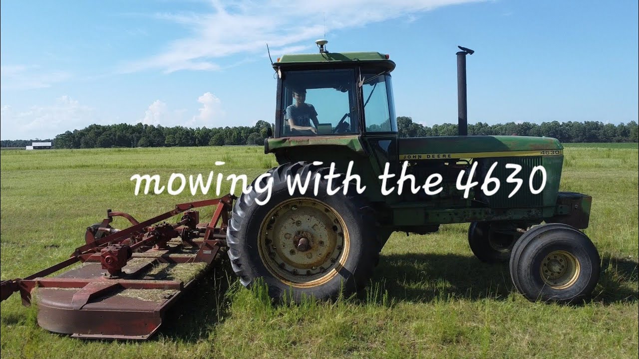 John Deere 4630 mowing down some weeds!