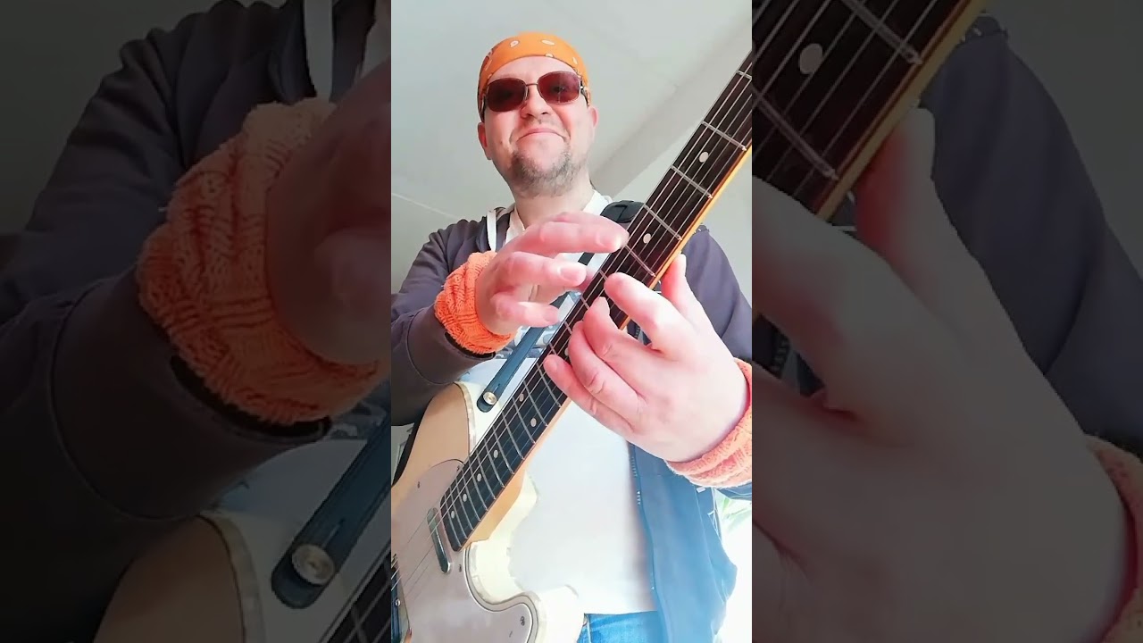 Playing guitar melodically using tapping technique 
