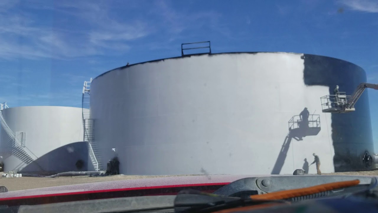 Painting top coat 2 million gallon tank Wilkinson Sandblasting LLC