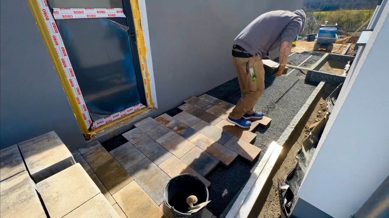 Muschelkalk Betonpflaster verlegen, Granitrabatten Eingangspodest herstellen,  Hofeinlauf einbauen