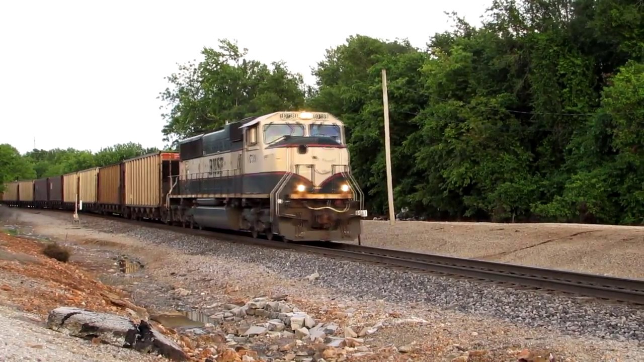 Lots of long freight trains roll through a busy junction!
