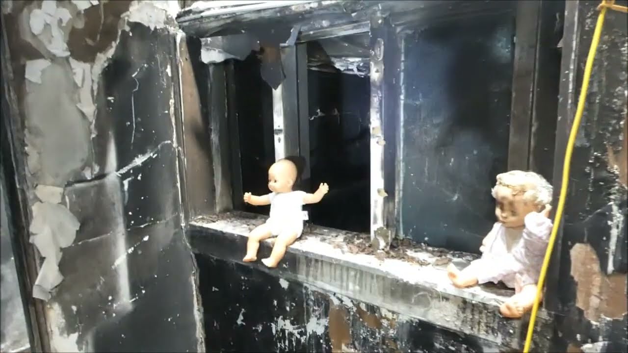 pub of fire with creepy dolls and rotting away food