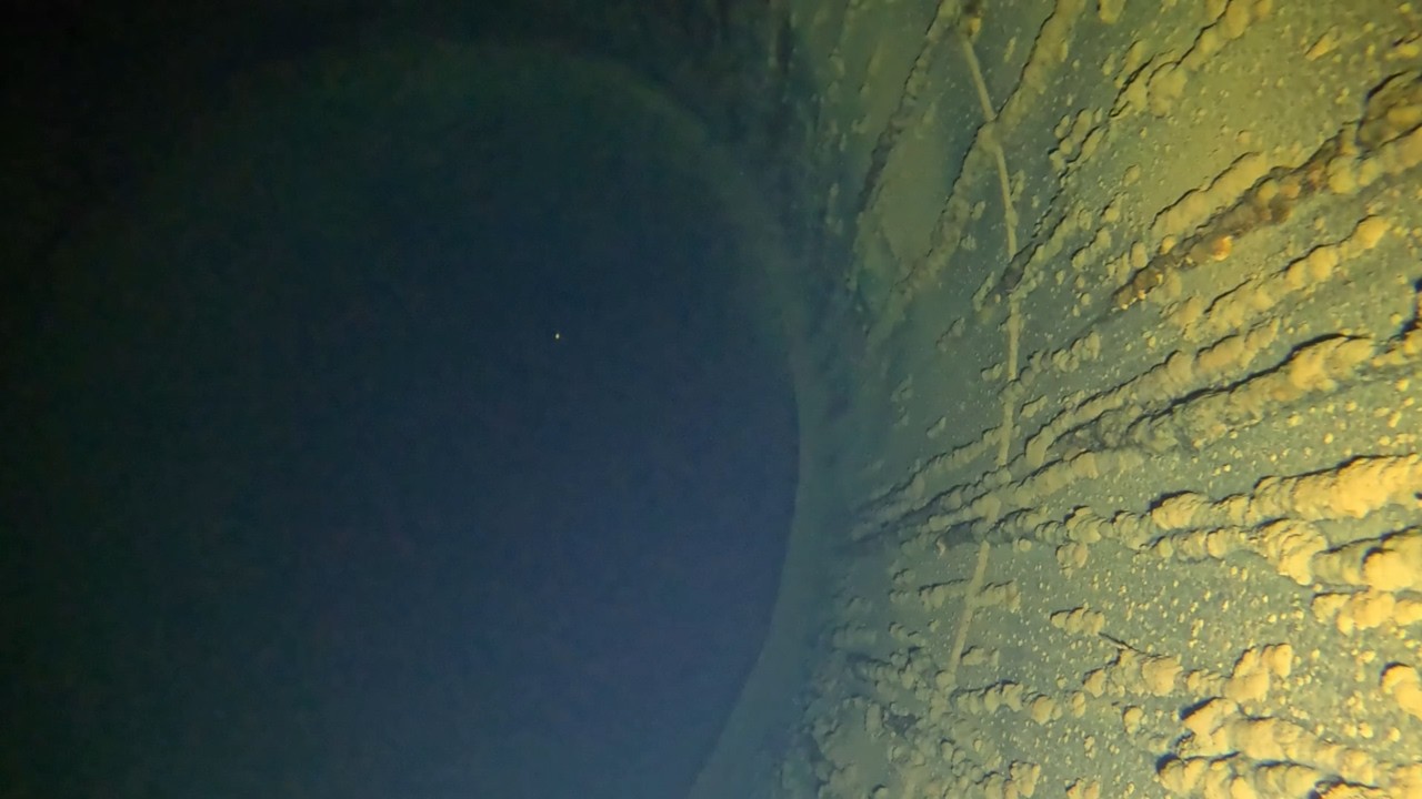 Dropping Camera Down A Deep Pipe Found At The Top Of A Mountain