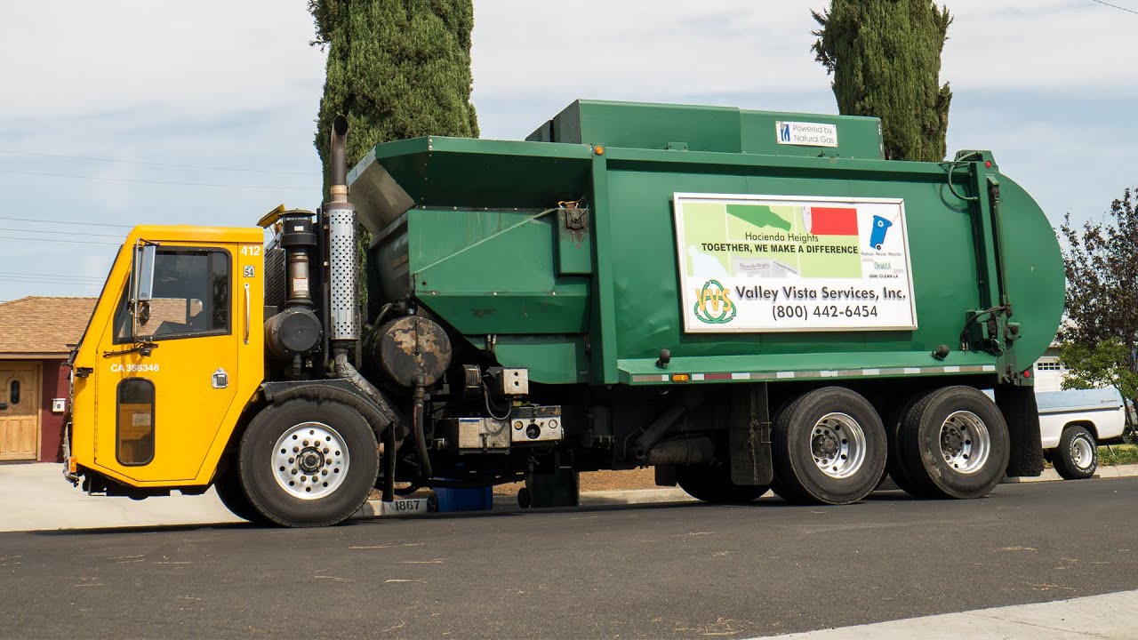 Valley Vista Services Spare CCC Pendpac Picking Up Trash