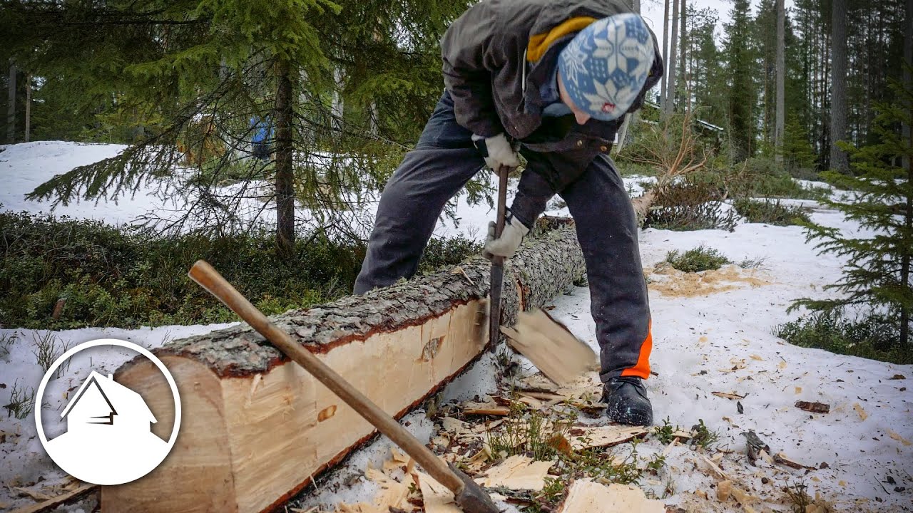 Project log cabin  | Hand hewing the ridgepole