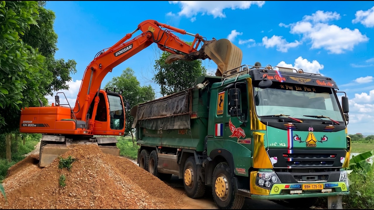 Powerful Doosan DX200W Excavator Loading a Dump Truck | Heavy Equipment in Action