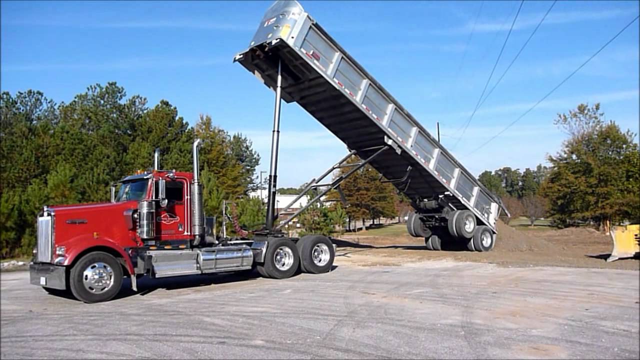 Kenworth  W900L Dumping Frameless Dump Trailer