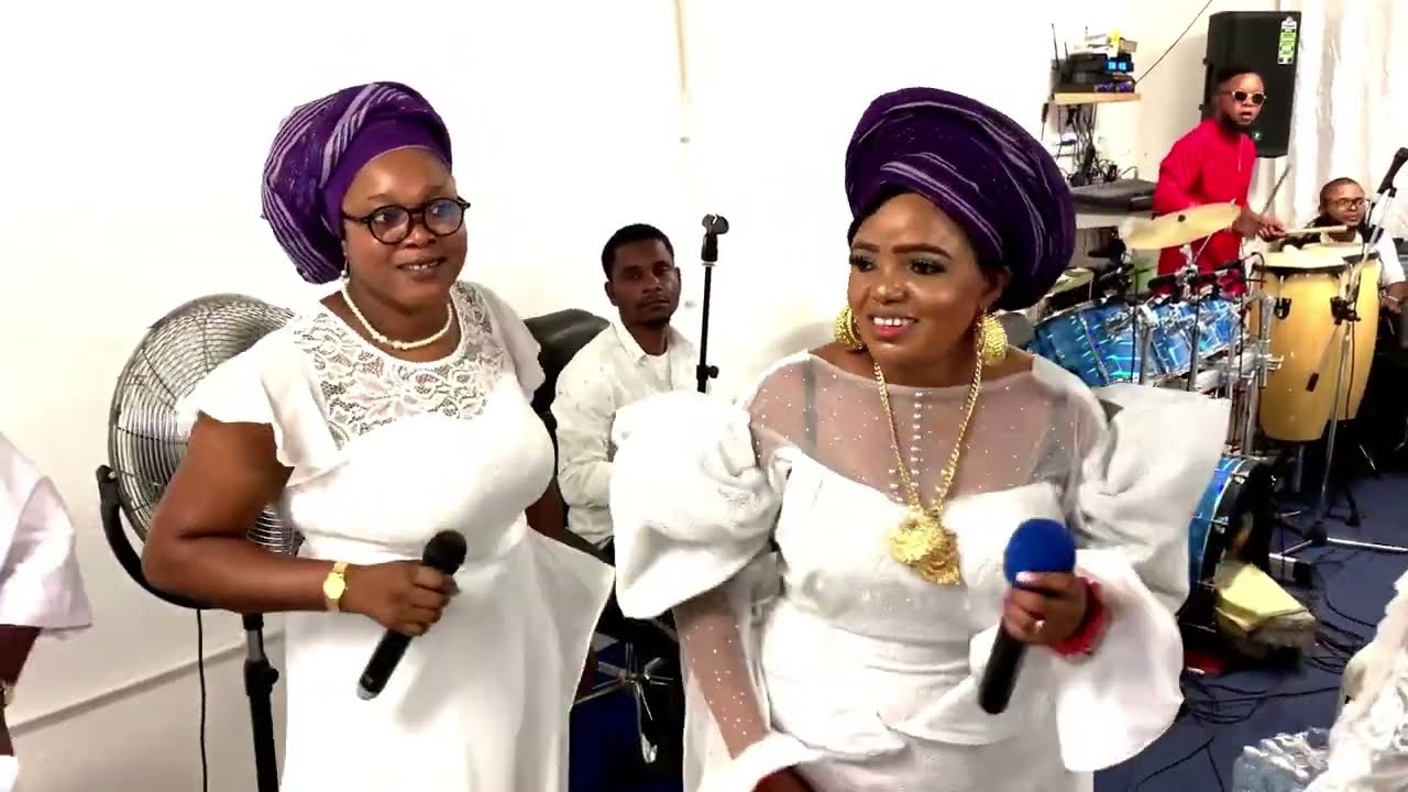 Lady J. Aimufua Ministering her own song 