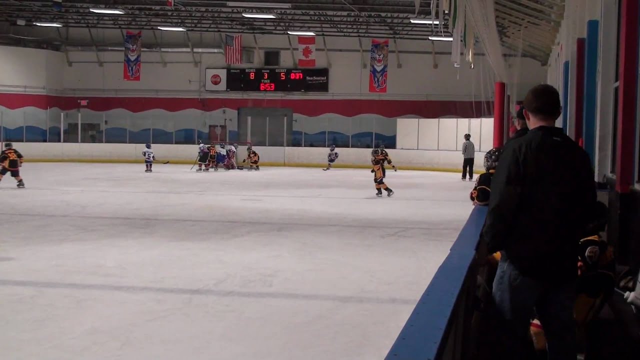 #001 - Golden Wolves 2009 Mites vs Miami Toros  at Pines Ice on 11-15-2009