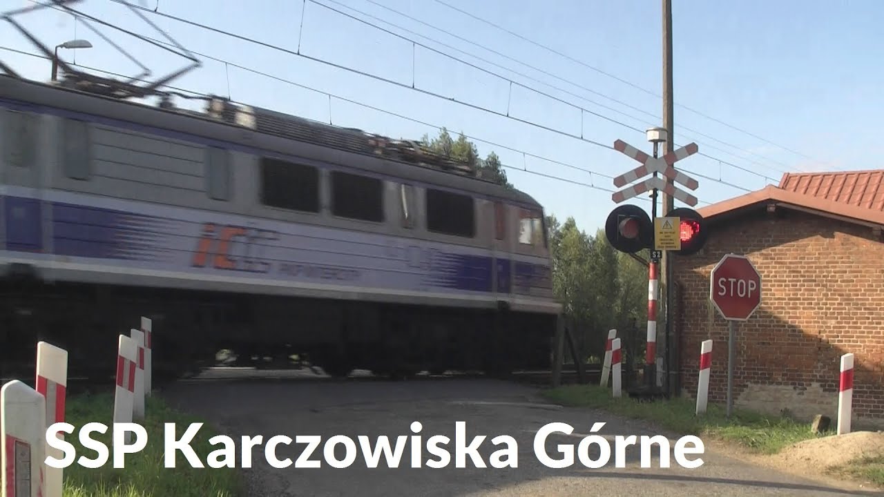 🇵🇱 Przejazd kolejowy / Railroad crossing [ SSP ] Karczowiska Górne - ST44-1233 i EP07-1055