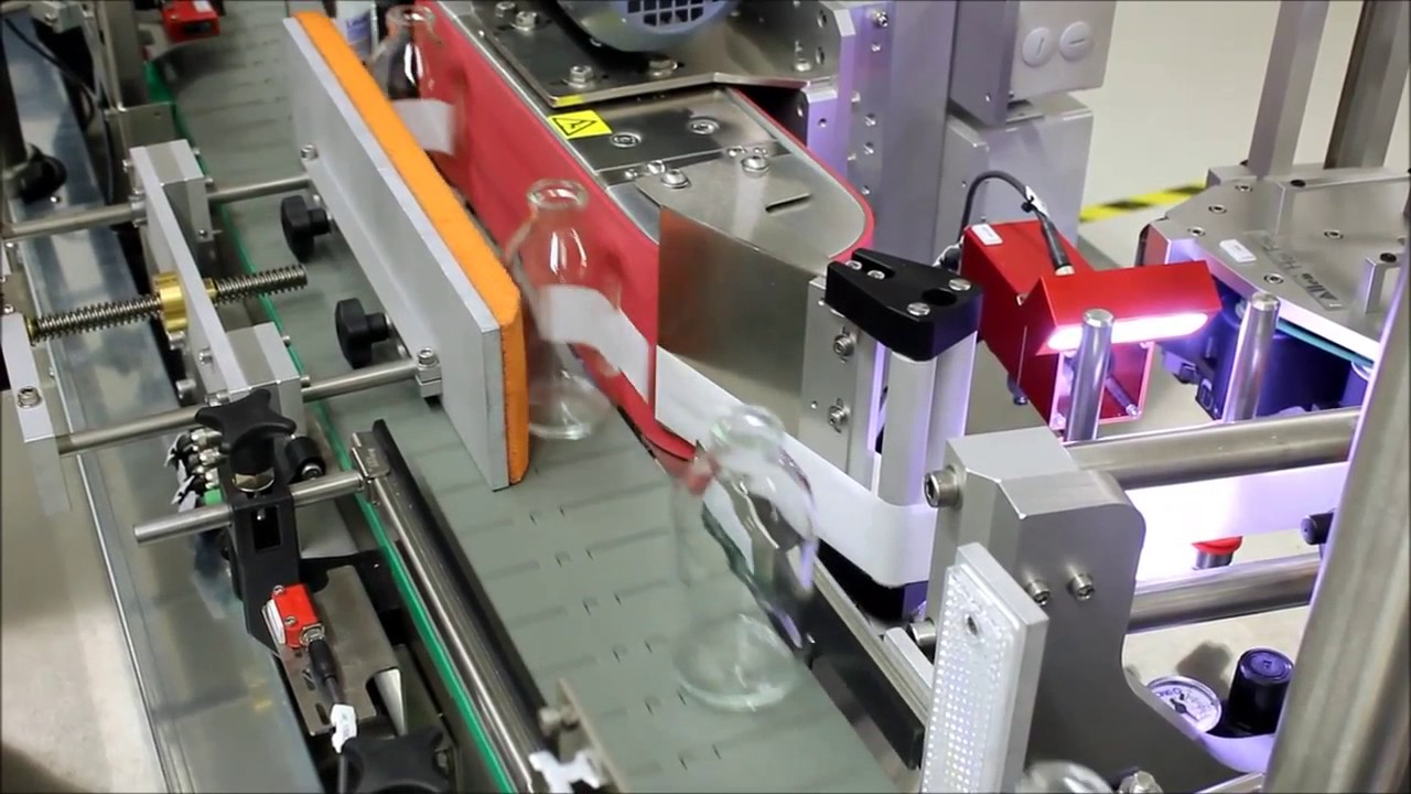 Etiqueteuse automatique GESET 726 : Pose d'étiquettes sur flacons