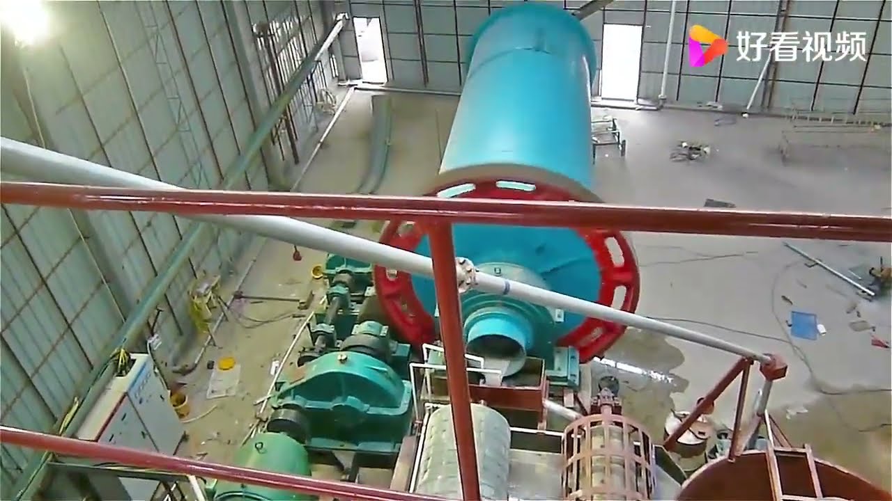 Wet overflow type ball mill operation